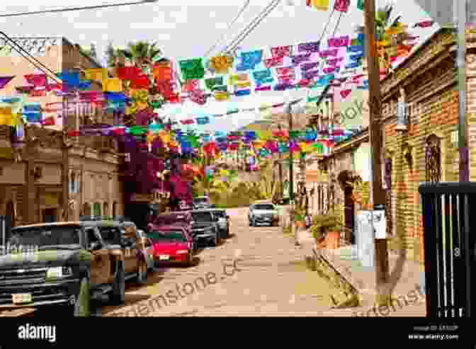 A Vibrant Street Scene In Todos Santos, Baja California, With Colorful Buildings, Art Galleries, And Charming Shops First Impressions: A Journey Into The Heart Of Baja California