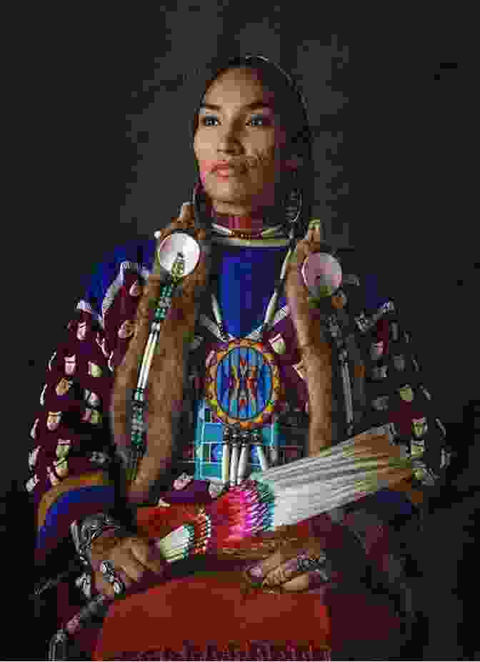 Portrait Of A Young Native American Woman With Vibrant Traditional Clothing And A Serene Expression My Life Among The Indians (Illustrated)